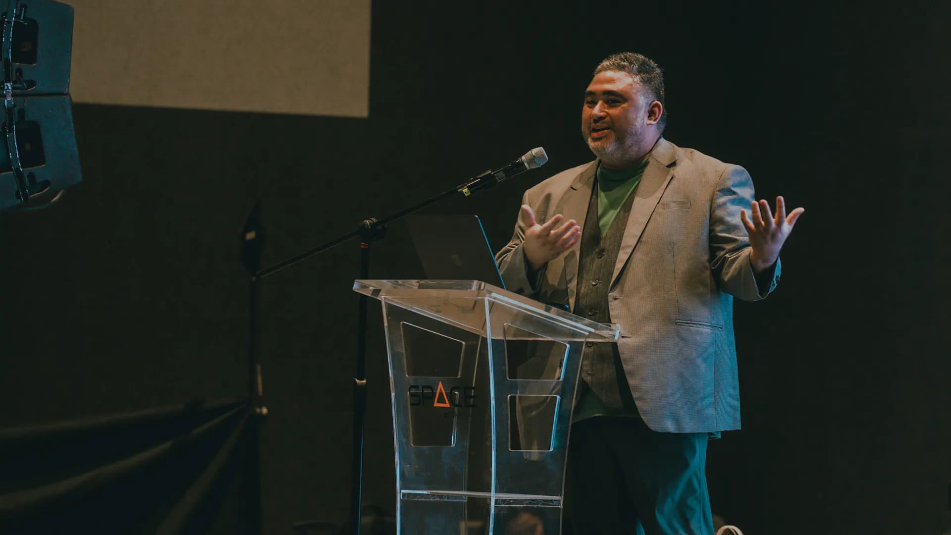 A speaker presenting at a Philippine AI industry event